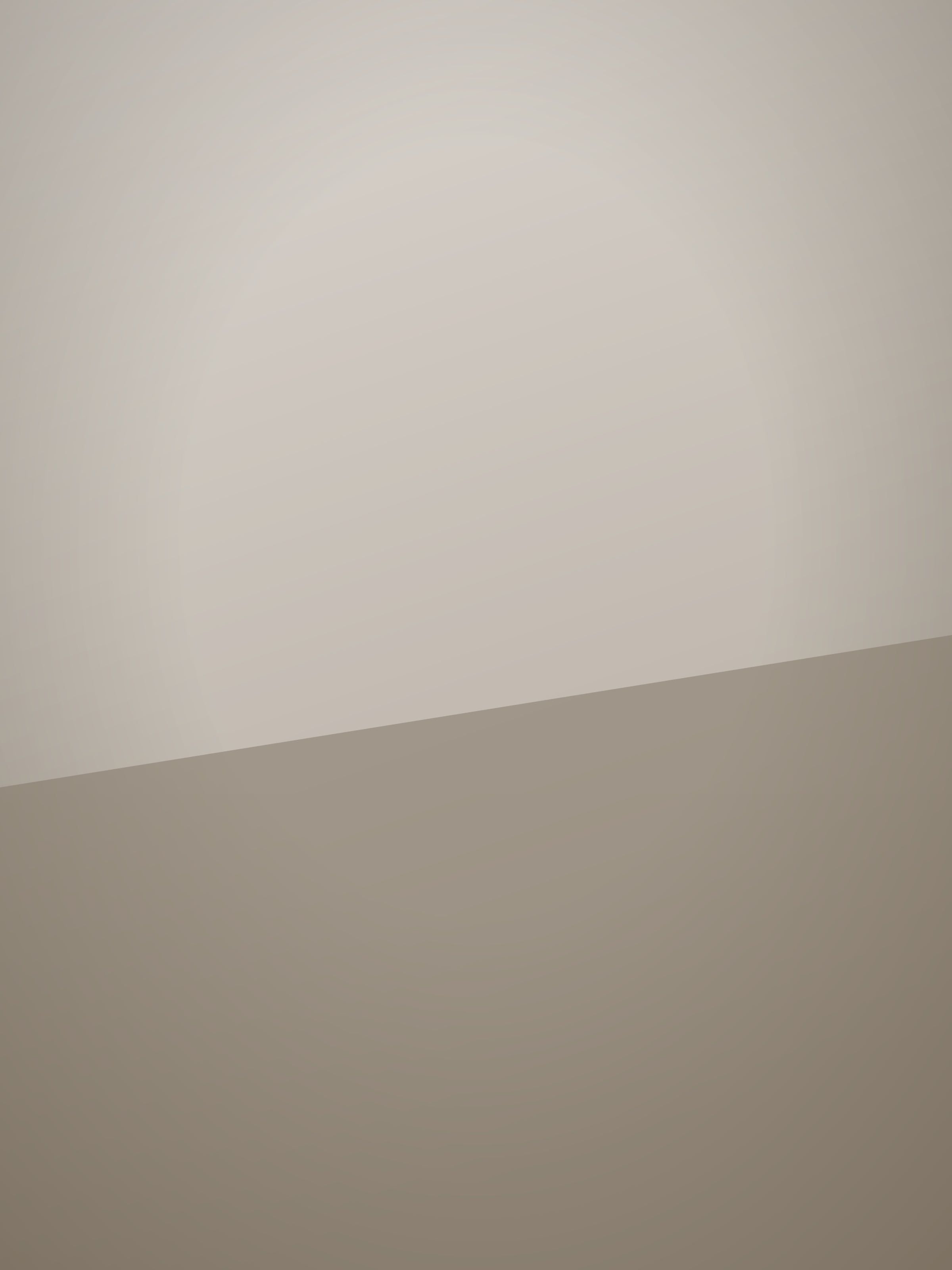 Rohan Mistry at a drawing board with a scale rule and a part-finished detail drawing